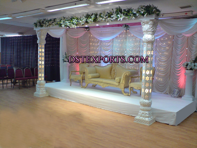 ASIAN WEDDING STAGE WITH FLOWERED PILLARS