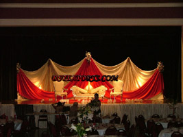 DESIGNER RED  GOLDEN  WEDDING STAGE