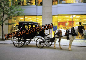 BLACK COVERED HORSE DRAWN CARRIAGE