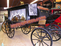 BLACK GLASS COVERED FUNERAL CARRIAGE