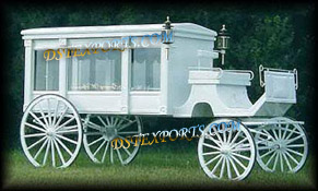WHITE COVERED HORSE DRAWN CARRIAGES